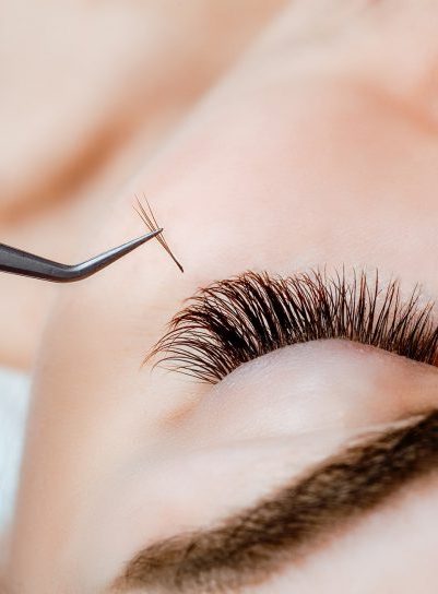 woman-eye-with-long-eyelashes-eyelash-extension-lashes-close-up-480x544